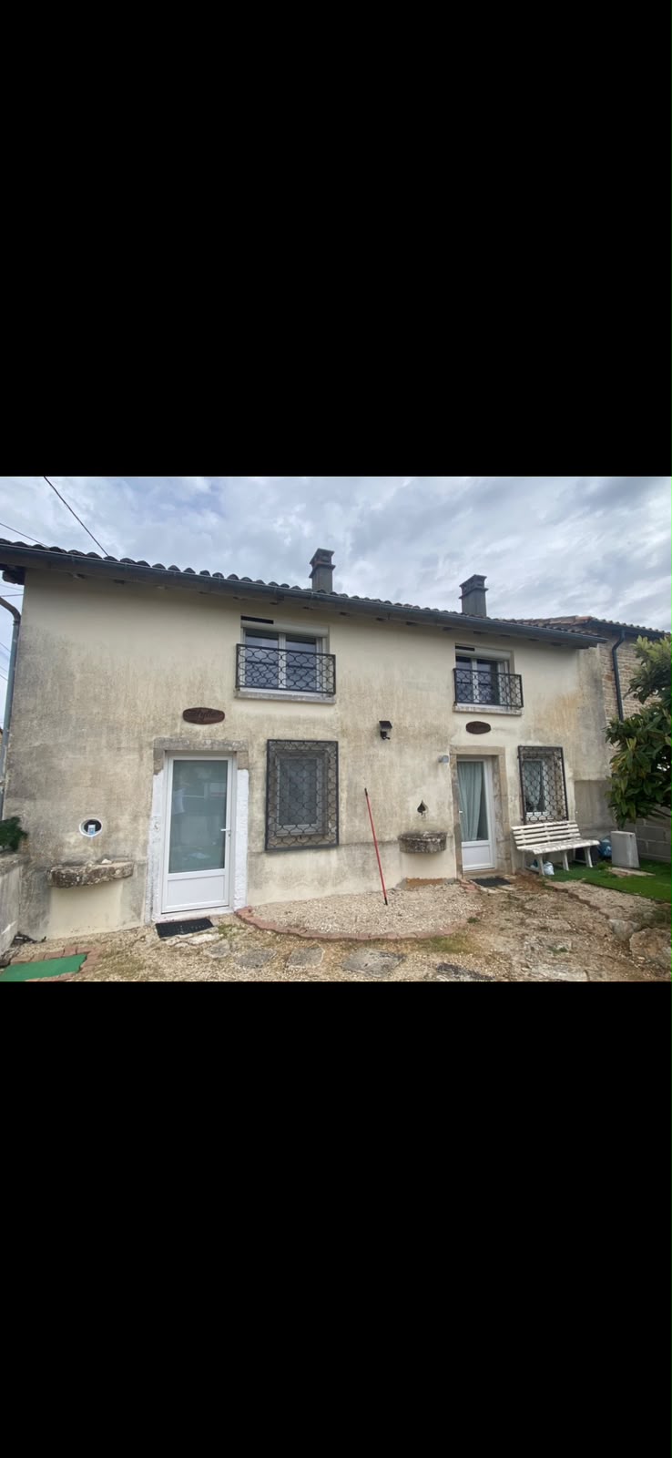 Façade avant ravalement, enduit dégradé